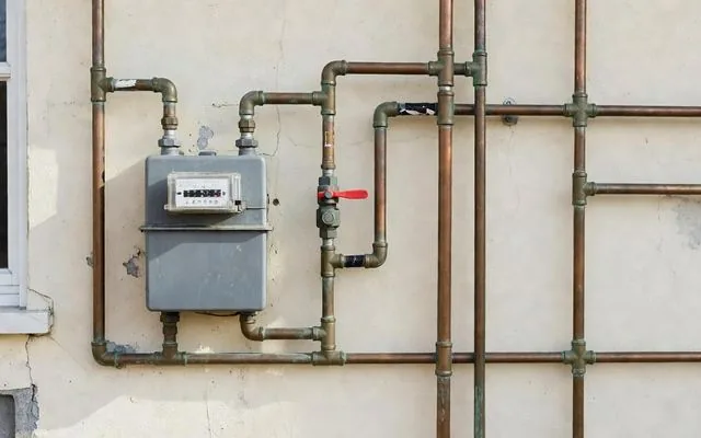 A domestic gas meter and copper pipework